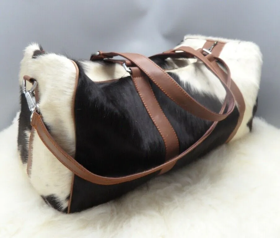 Custom made cowhide duffel bags.