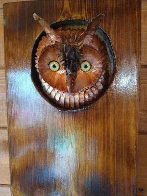 Long-eared owl copper sculpture