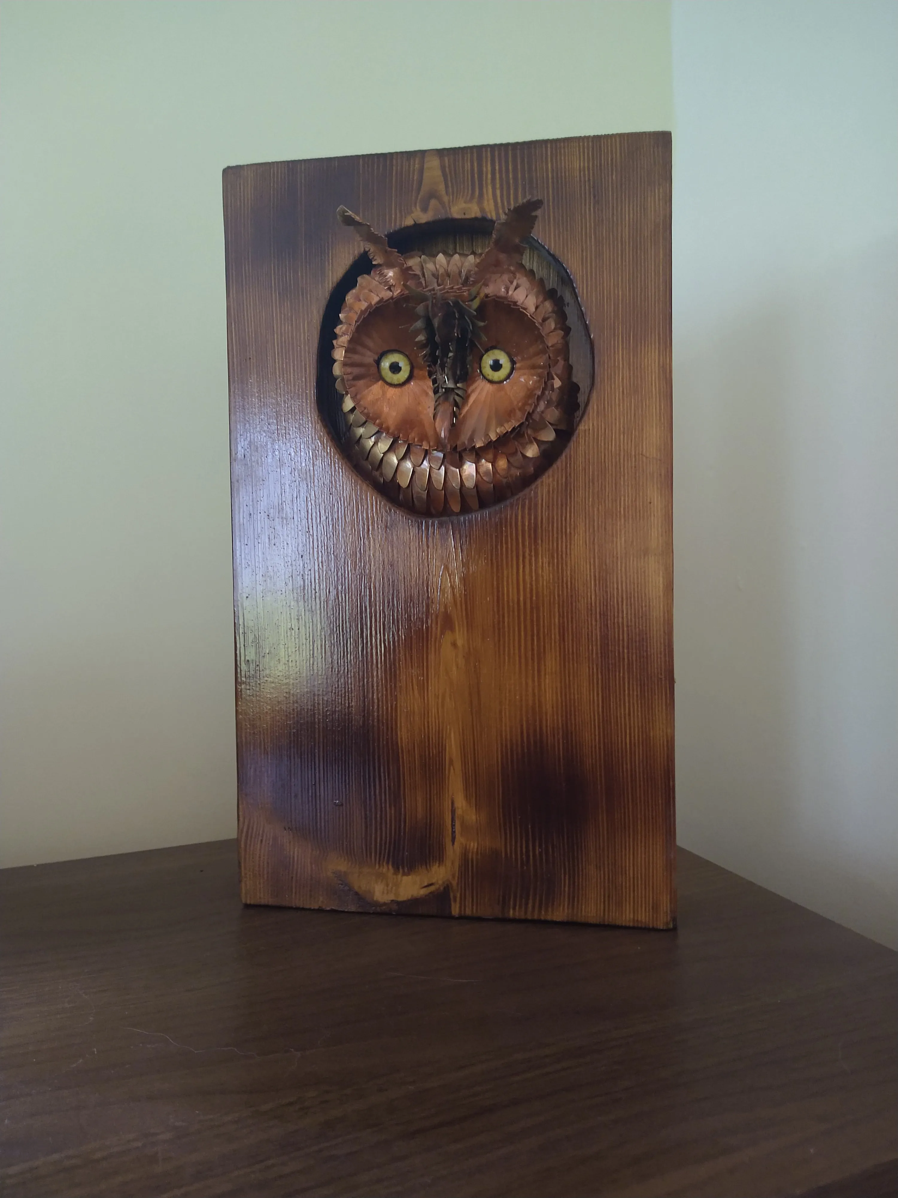 Long-eared owl copper sculpture