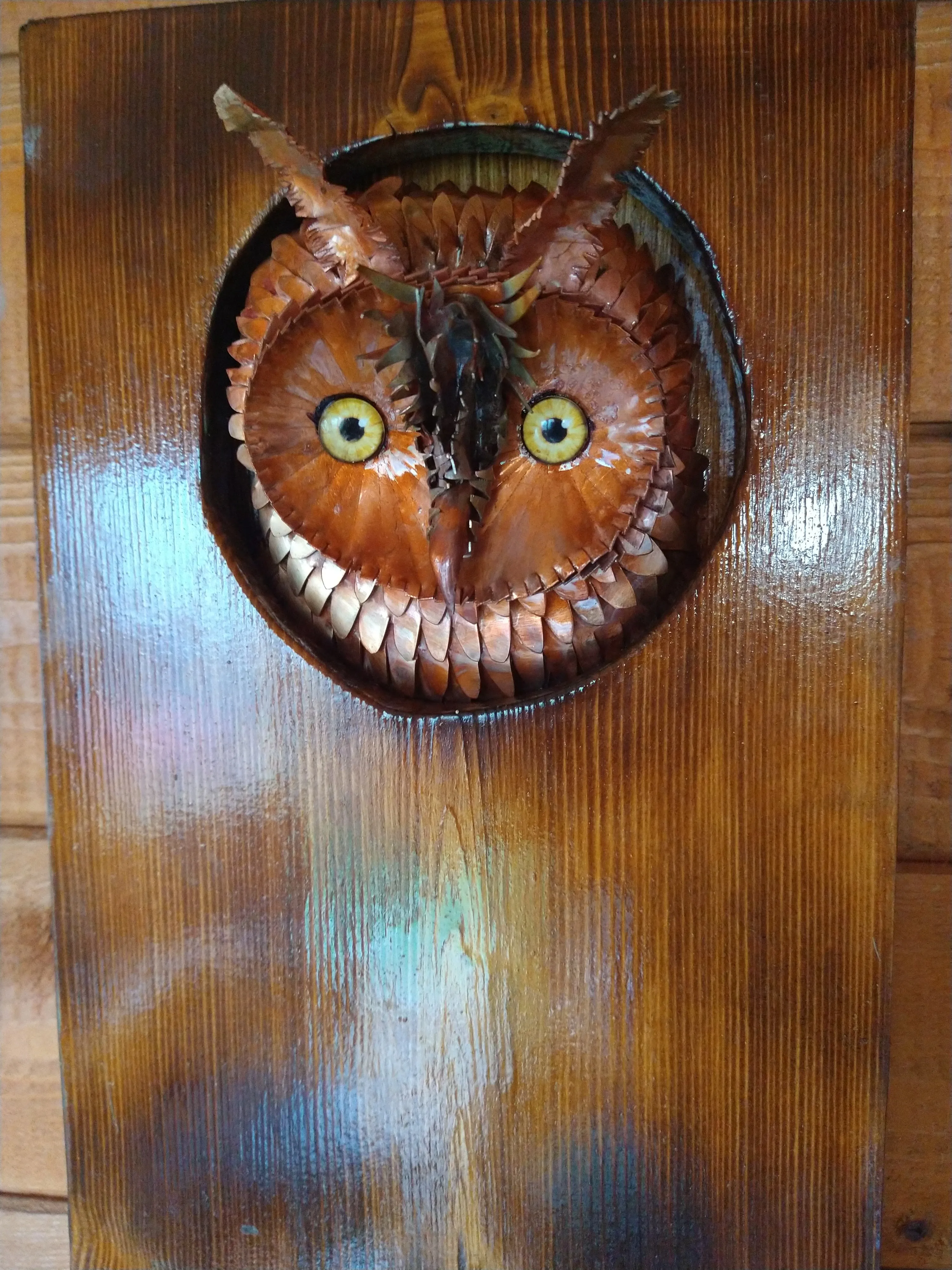 Long-eared owl copper sculpture