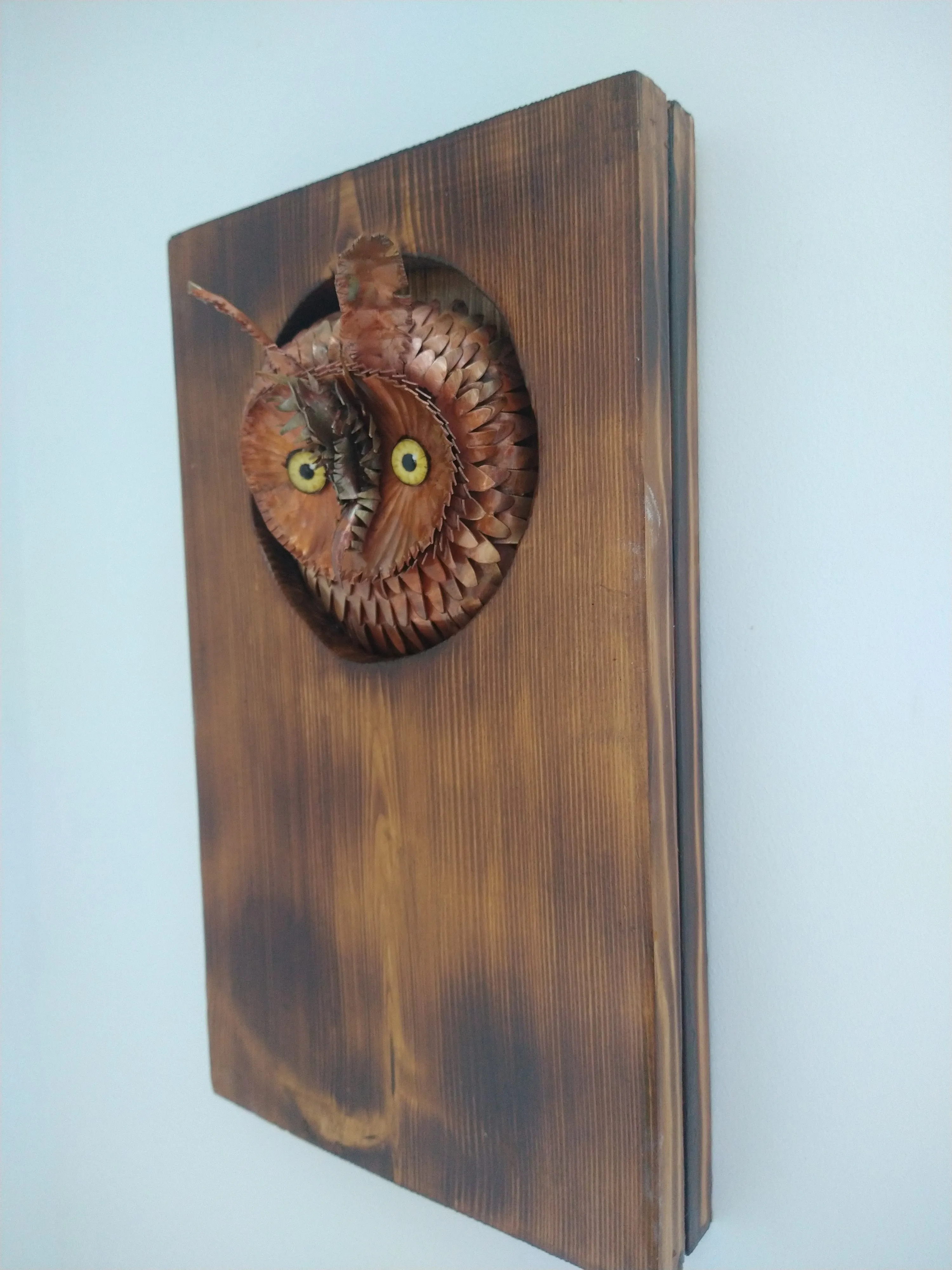 Long-eared owl copper sculpture