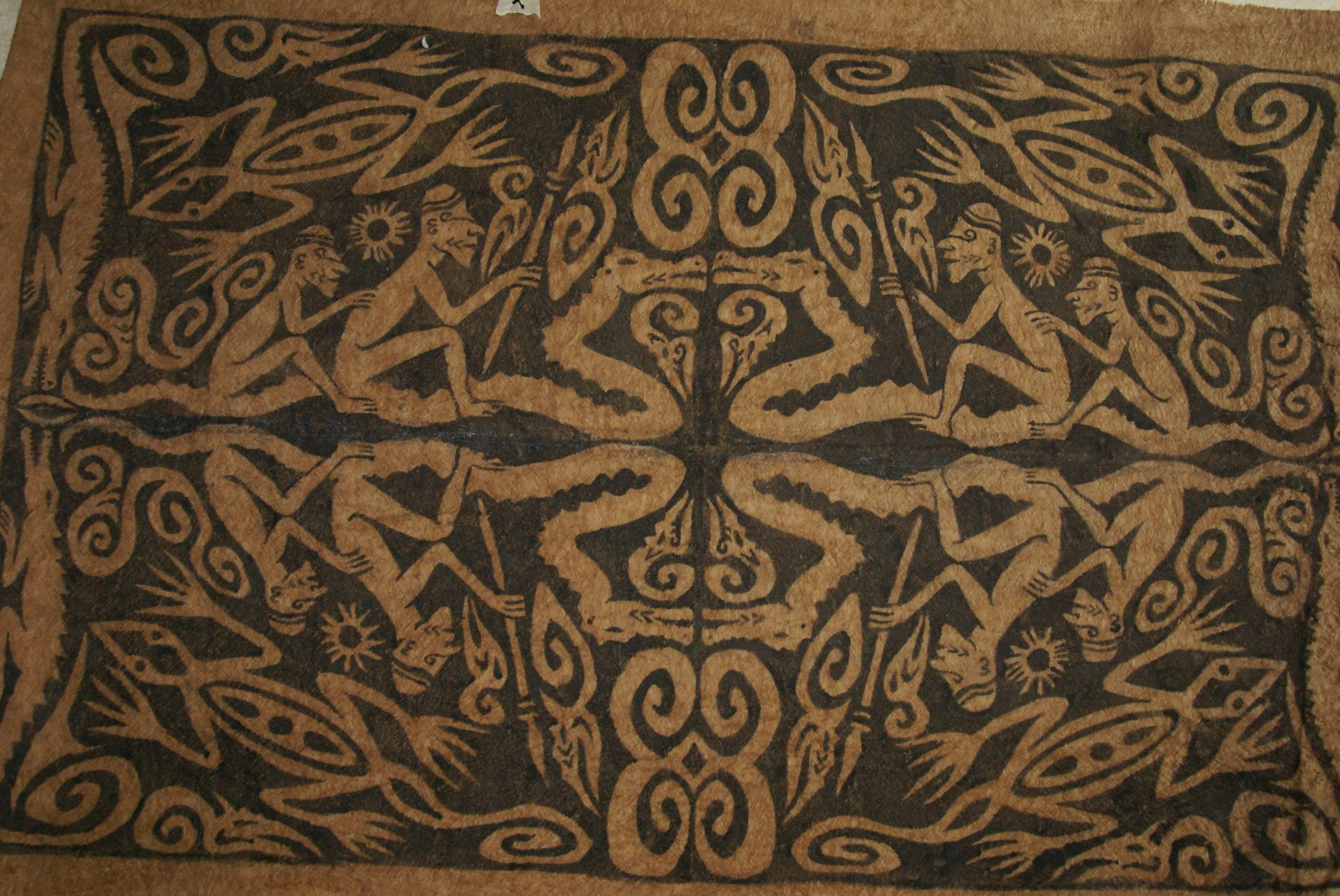 Rare Tapa Bark Cloth (Kapa in Hawaii), from Lake Sentani, Irian Jaya, Papua New Guinea. Hand painted by a Tribal Artist with natural pigments: Spiritual Stylized Warrior Weapons, Snakes, Crocodiles, Gecko Motifs & waves 28" x 18" (no 10)